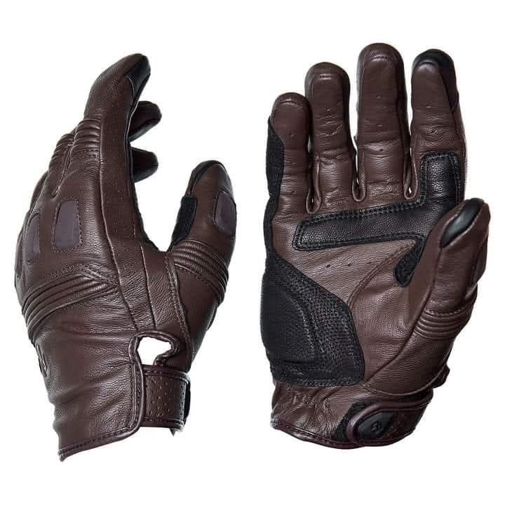 Pair of brown leather gloves with black accents on a white background