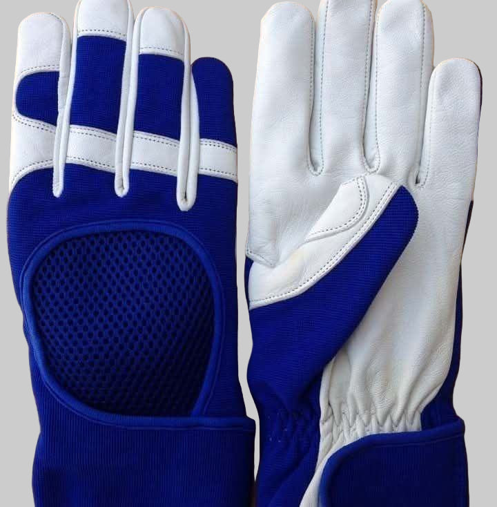 Pair of blue and white gloves on a wooden surface