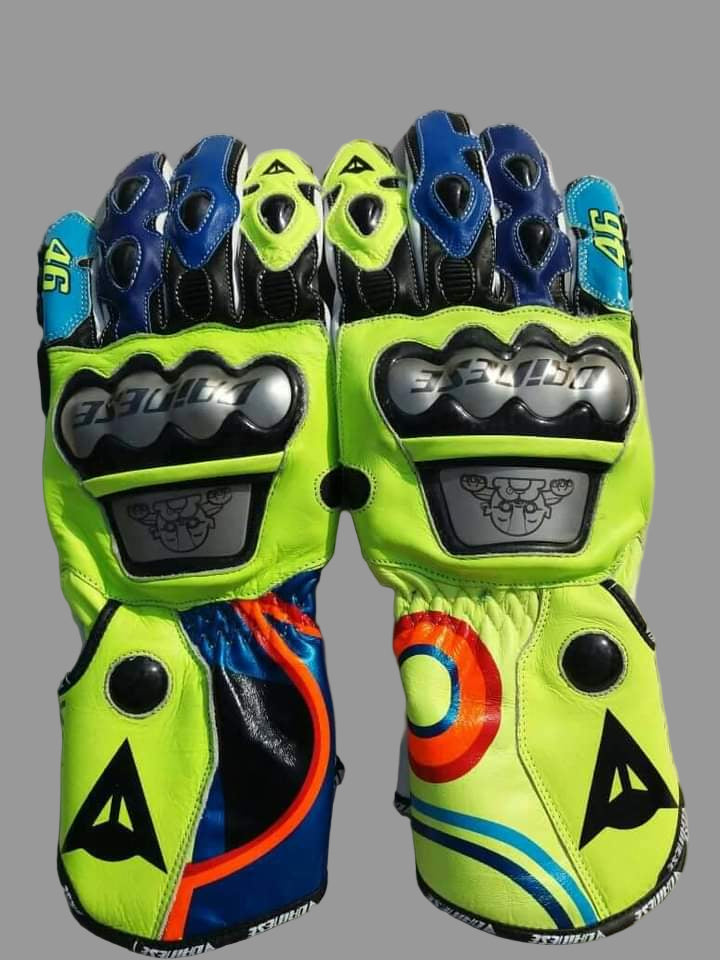 Pair of colorful motorcycle gloves with brand logo on a light gray background