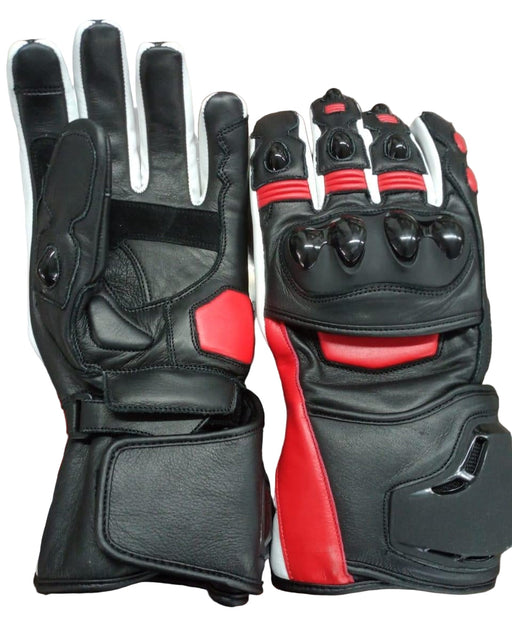 Black and red leather gloves on a wooden surface